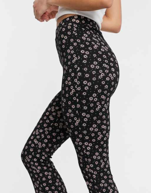 ASOS DESIGN Tall flare trouser in cow print