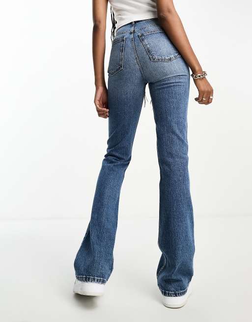 ASOS DESIGN Tall flared jeans in dark blue