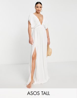 mid length white dress with sleeves