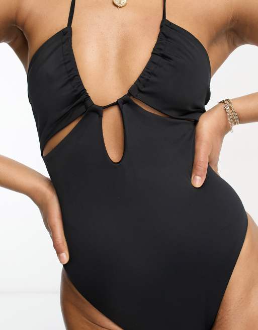 ASOS DESIGN gathered ruched cut out swimsuit in black