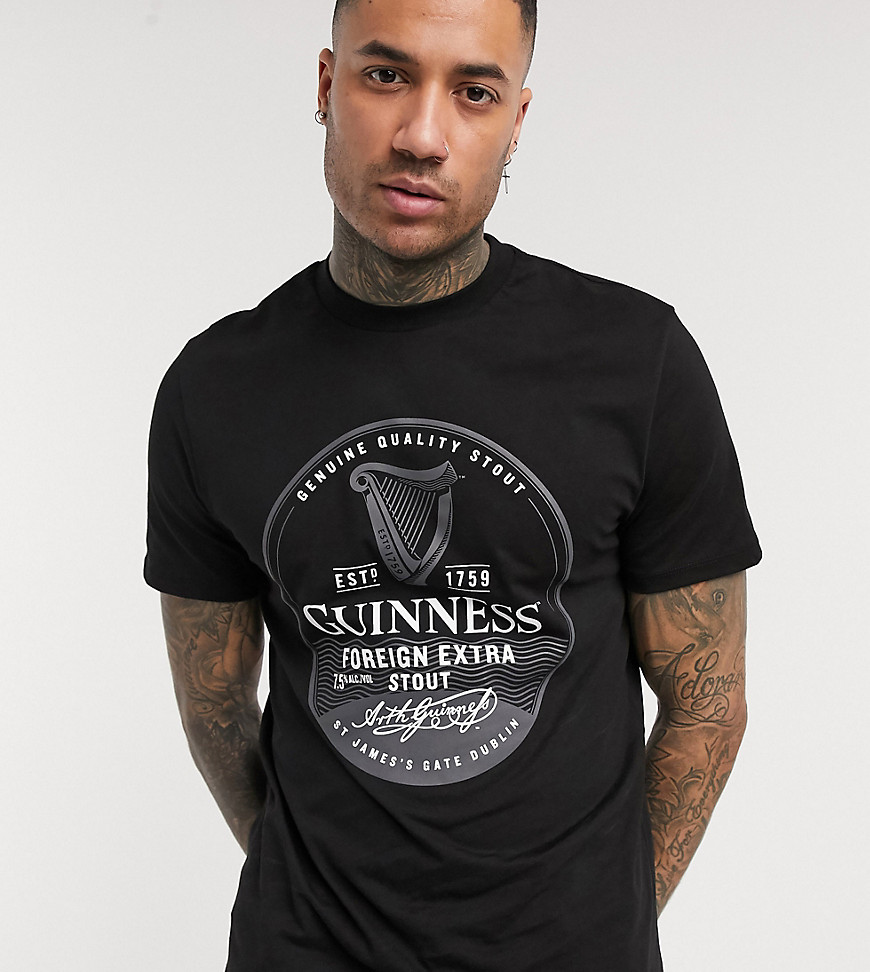 ASOS DESIGN Tall - Guinness - T-shirt con grande logo sul davanti-Nero