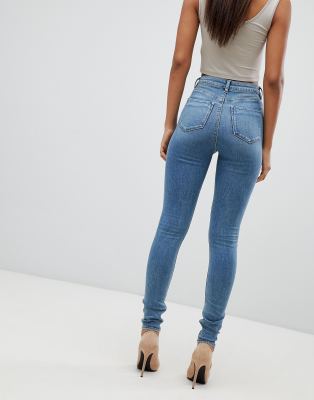 ASOS DESIGN Tall high rise ridley skinny jeans in pretty mid stonewash ASOS