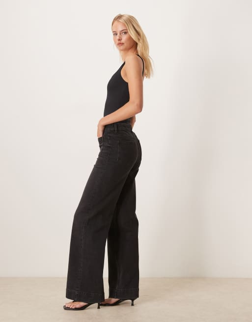 ASOS DESIGN Tall high rise wide leg jeans with front pockets in black