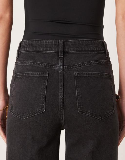 ASOS DESIGN Tall high rise wide leg jeans with front pockets in black