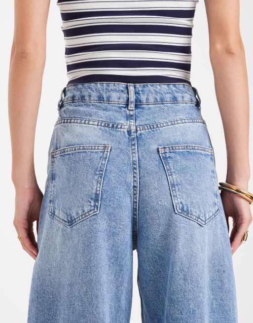 ASOS DESIGN Tall high waist barrel leg jeans in light mid blue