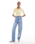 [ASOS Tall] ASOS DESIGN Tall high waisted barrel leg jeans in light mid blue 14 Mid blue