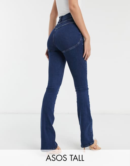 ASOS DESIGN Tall flared jeans in mid blue