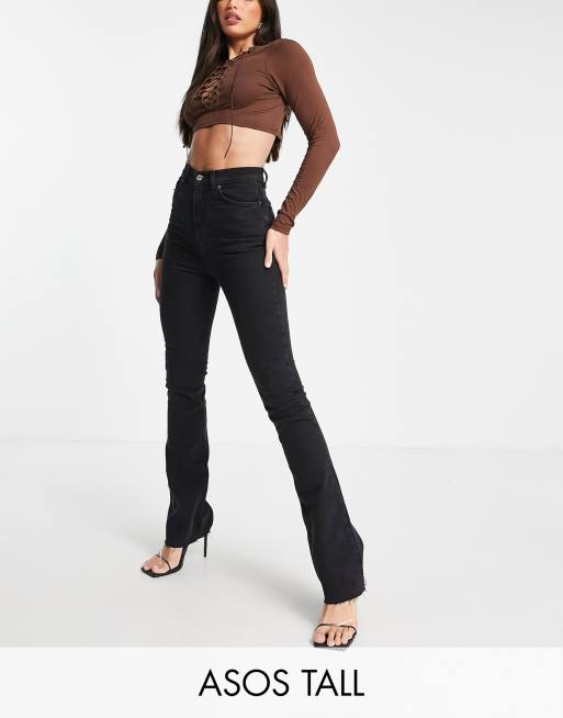 ASOS DESIGN Tall - Jeans a zampa anni '70 elasticizzati a vita alta, colore nero slavato
