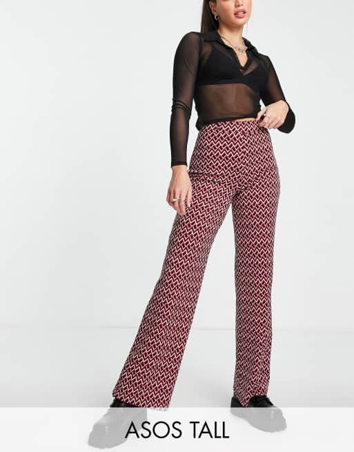 ASOS DESIGN Tall jersey wide relaxed flare suit trouser in geo print 
