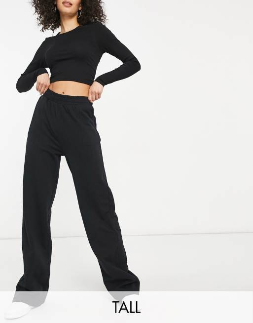 ASOS DESIGN Tall - Joggingbroek met lage taille en rechte pijpen met plooitjes in zwart