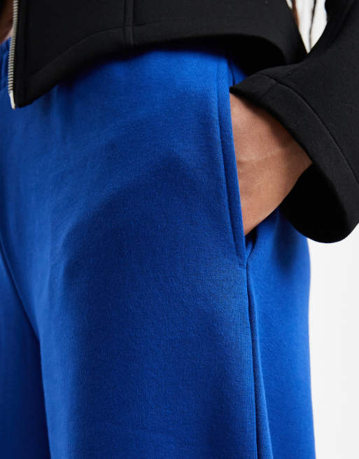 ASOS DESIGN Tall – Jogginghose in Tiefblau, mit weicher Innenseite und abgerundetem Bein, 4 von 5