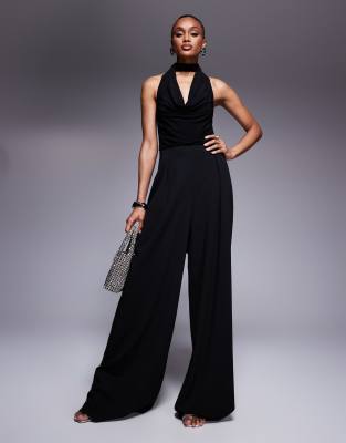 ASOS DESIGN Tall - Jumpsuit in Schwarz aus Materialmix mit weitem Bein, Wasserfallausschnitt und Bindedetail am Ausschni...