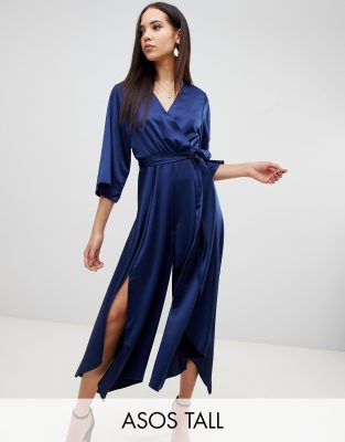 ASOS DESIGN Tall jumpsuit with wrap front and hanky hem in satin-Navy