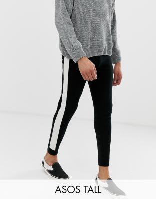 ASOS DESIGN Tall knitted joggers with side stripe in black