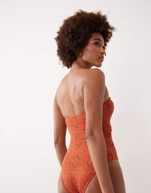 ASOS DESIGN Tall Kyle broderie Brooke twist front bandeau swimsuit in rust, 3 of 4
