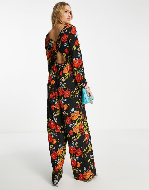 ASOS DESIGN Tall Langarmliger Jumpsuit aus Blasenkrepp mit Blumenmuster und Knopfverschluss auf der Ruckseite ASOS