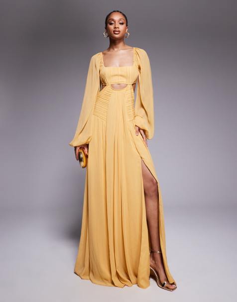 ASOS DESIGN Tall long sleeve cut out maxi dress with ruched skirt in mustard - view 1