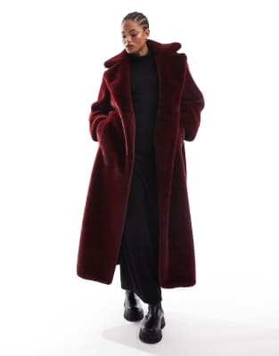 ASOS DESIGN Tall longline belted faux fur coat in burgundy-Red