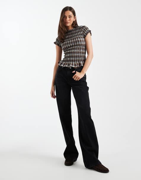 ASOS DESIGN Tall low rise baggy jeans in black - view 1