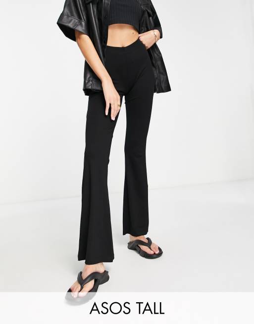 ASOS DESIGN Tall kick flare pants in black