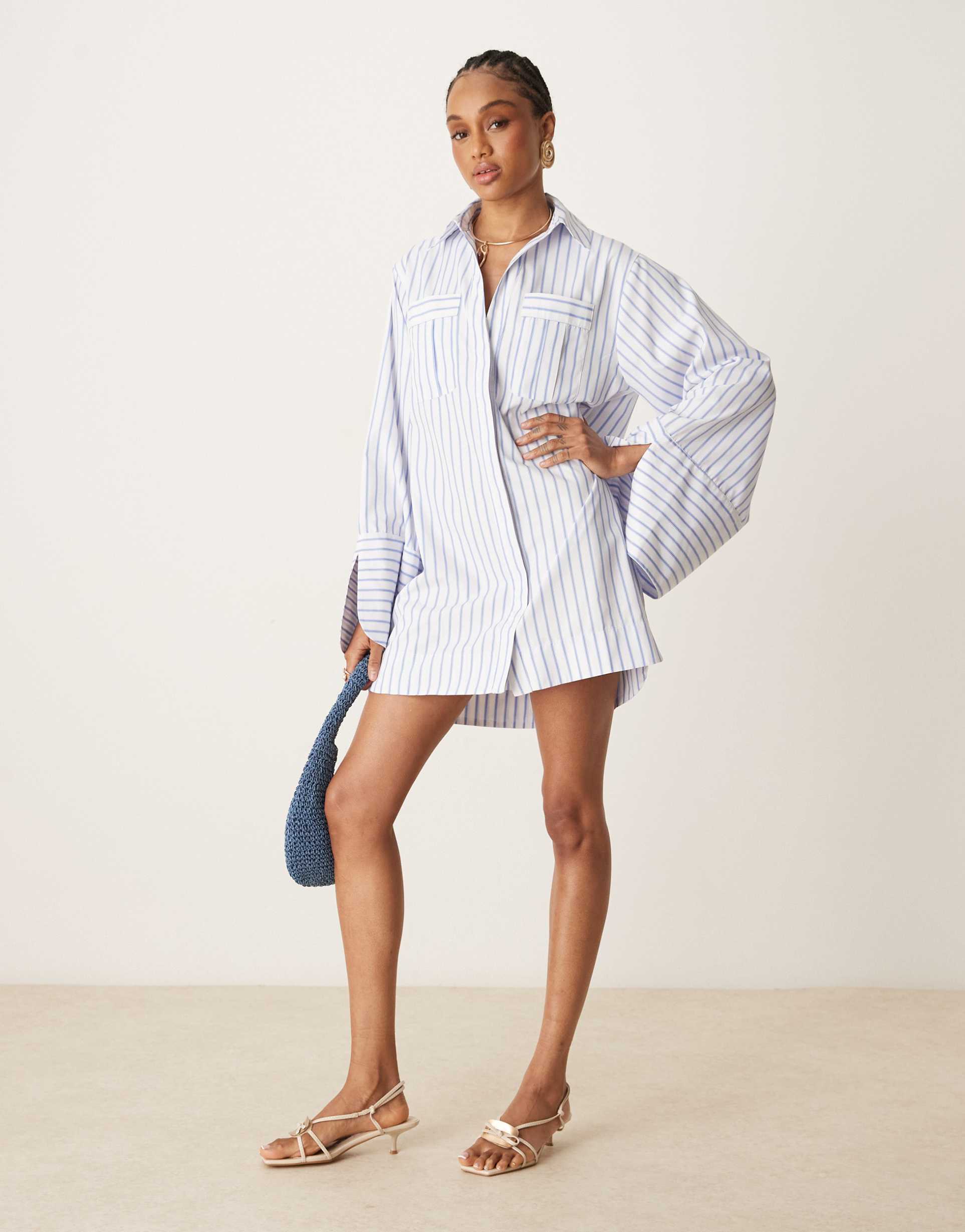 asos design tall mini shirt dress with wide cuffs and oversized pockets in blue stripes