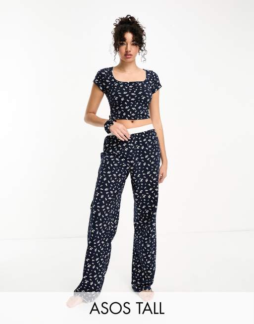 ASOS DESIGN Tall – Mix and Match – Pyjamahose in Marineblau mit Blümchenmuster, freiliegendem Taillenband und Picot-Besatz