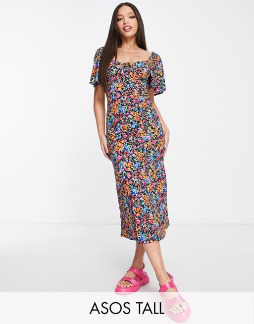 ASOS DESIGN Tall - Nette midi-jurk met fladdermouwen en gestrikt detail in zwart met felgekleurde bloemenprint