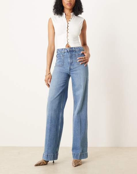 ASOS DESIGN Tall high waist wide leg jeans with front pockets in&nbsp;mid blue