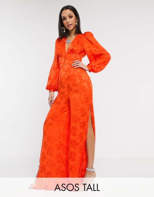 ASOS DESIGN – Tall – Orange, blommig jacquard-jumpsuit i satin med blusärm