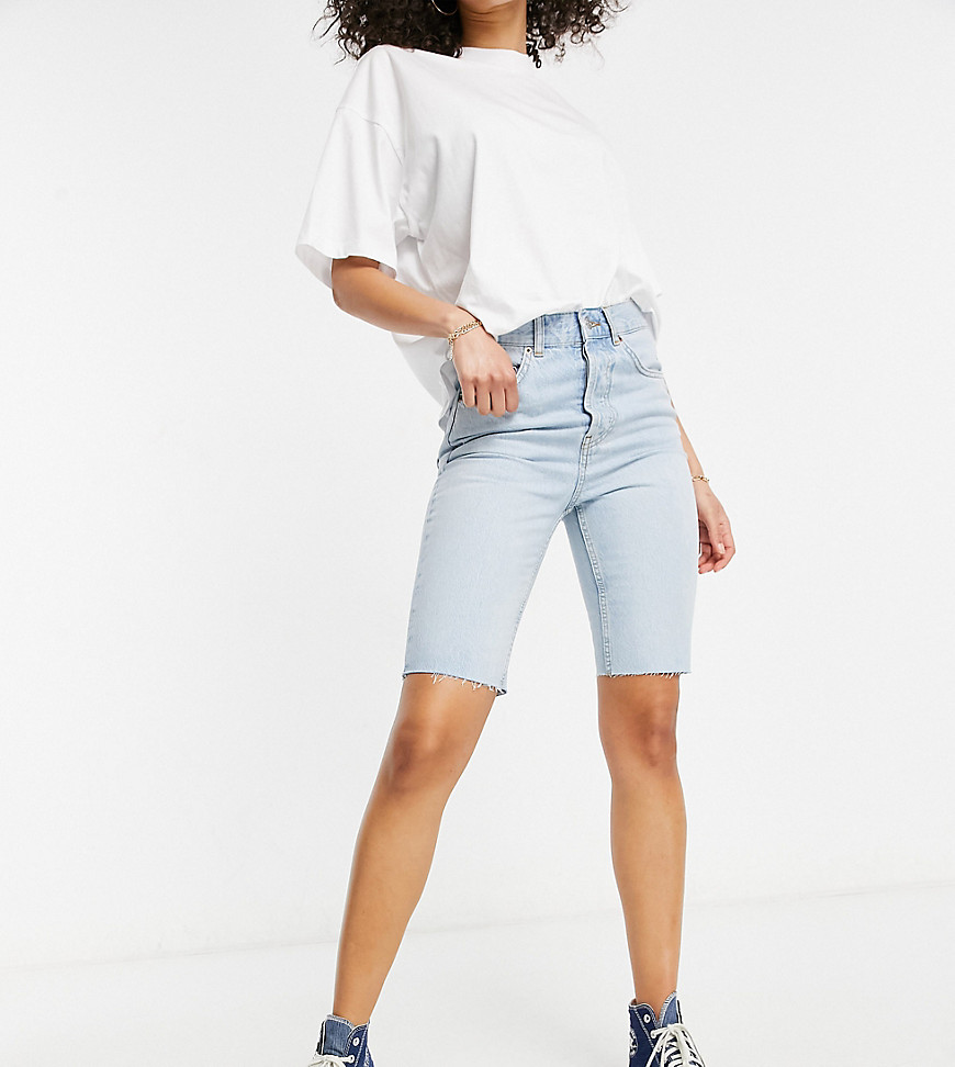 ASOS DESIGN Tall organic cotton blend denim '90s' longline shorts in lightwash-Blues