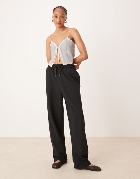 ASOS DESIGN Tall – Oversize-Jogginghose in Schwarz mit umgeschlagenem Saum - view 1