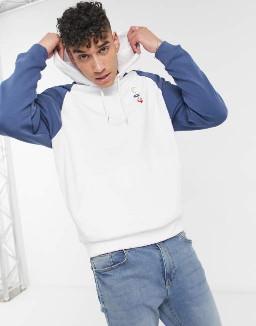 ASOS DESIGN Tall sweatshirt with contrast raglan sleeves and raw edge seam  detail