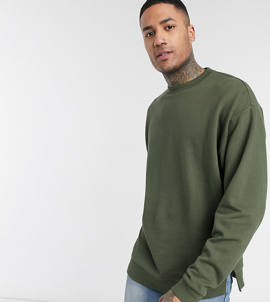 ASOS DESIGN Tall oversized sweatshirt in dark green with split hem