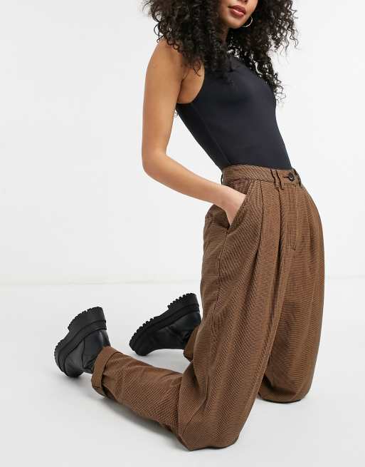 ASOS DESIGN Tall ovoid pleat front peg pants in tan dogtooth