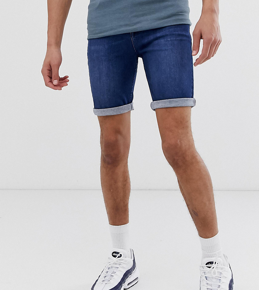 ASOS DESIGN Tall - Pantaloncini di jeans spray on lavaggio medio power stretch-Blu