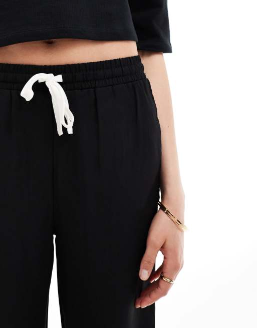 ASOS DESIGN Tall - Pantaloni neri con pannello a contrasto, 4 di 5
