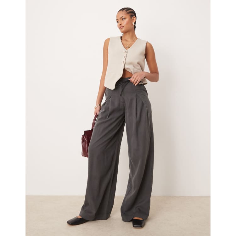 ASOS DESIGN Tall pleated wide leg pants with tie in gray | ASOS