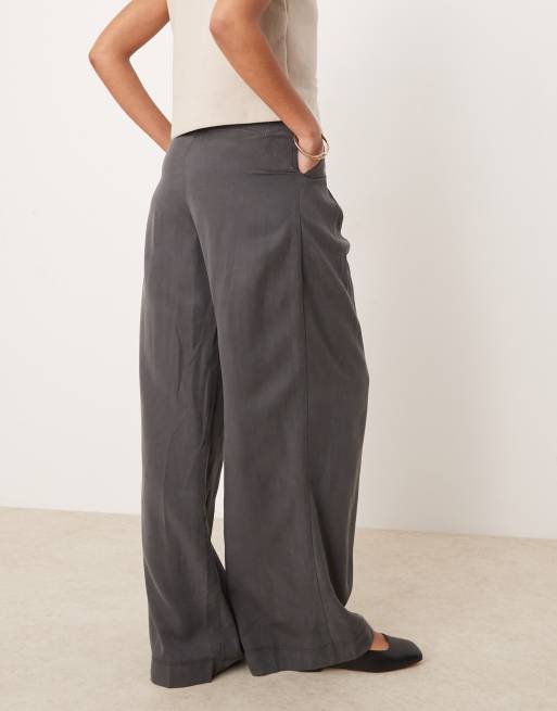 ASOS DESIGN Tall pleated wide leg trouser with tie in grey ASOS