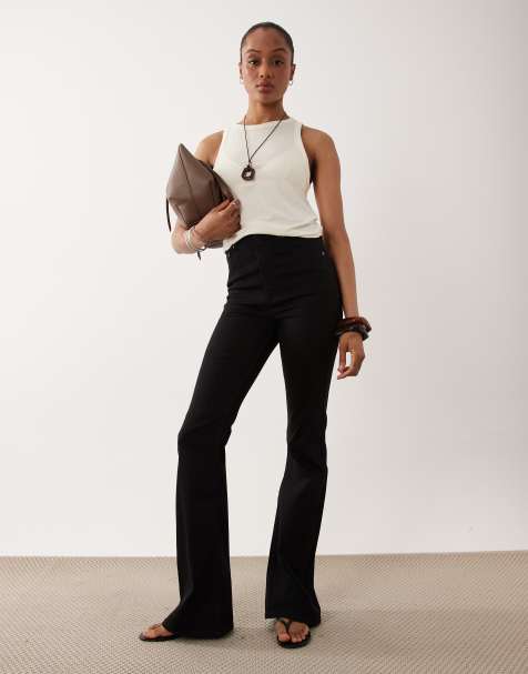 ASOS DESIGN Tall power stretch sculpt flare jeans in black - view 1