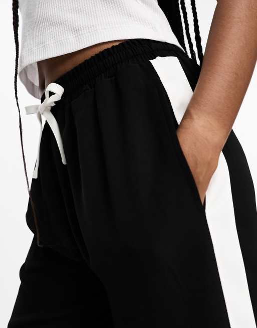 ASOS DESIGN Tall pull on pants with contrast panel in black