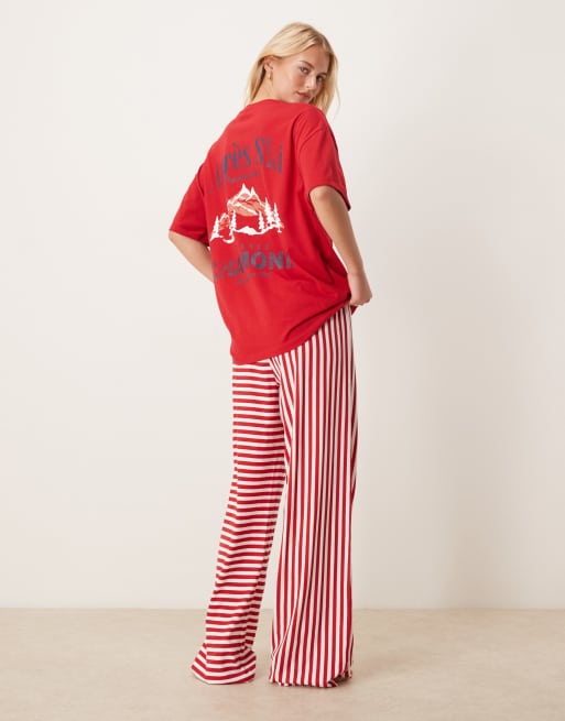 ASOS DESIGN Tall – Pyjama aus Oversize-T-Shirt mit „Après Ski“-Print und Hose mit weitem Bein