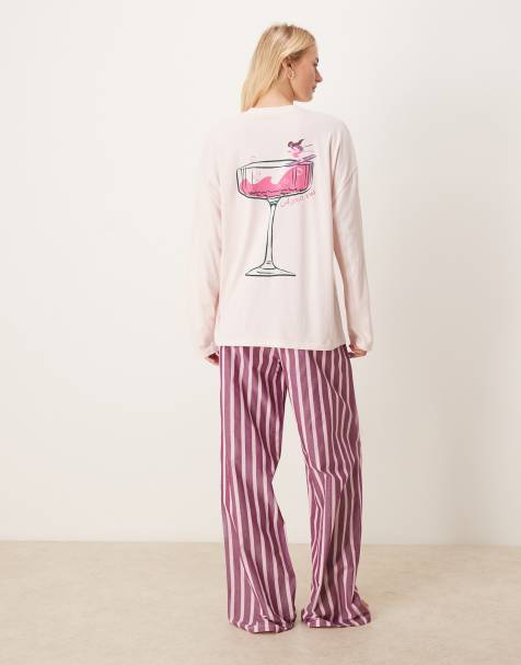 ASOS DESIGN Tall - Pyjama avec t-shirt manches longues oversize à imprimé cocktail et pantalon tissé ample à rayures - Rose - view 1