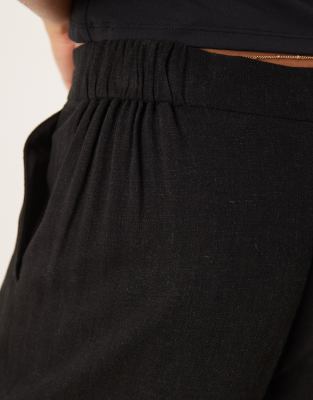 ASOS DESIGN Tall relaxed straight leg trousers with linen in black