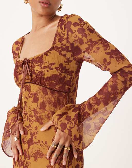 ASOS DESIGN Tall ruched bust long sleeve maxi dress in orange abstract print
