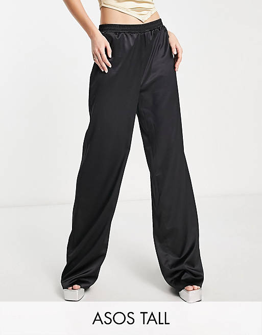 melk De gasten Manieren ASOS DESIGN Tall - Satijnen broek met elastische taille in zwart | ASOS