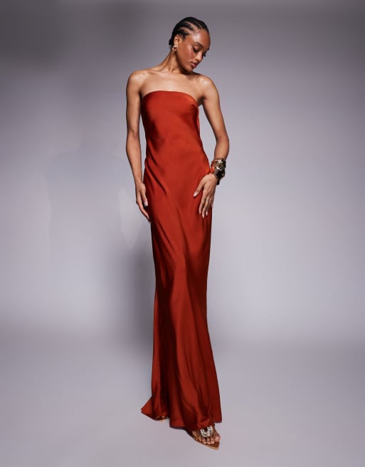 ASOS DESIGN Tall satin trapeze bandeau maxi dress with bow back detail in rust