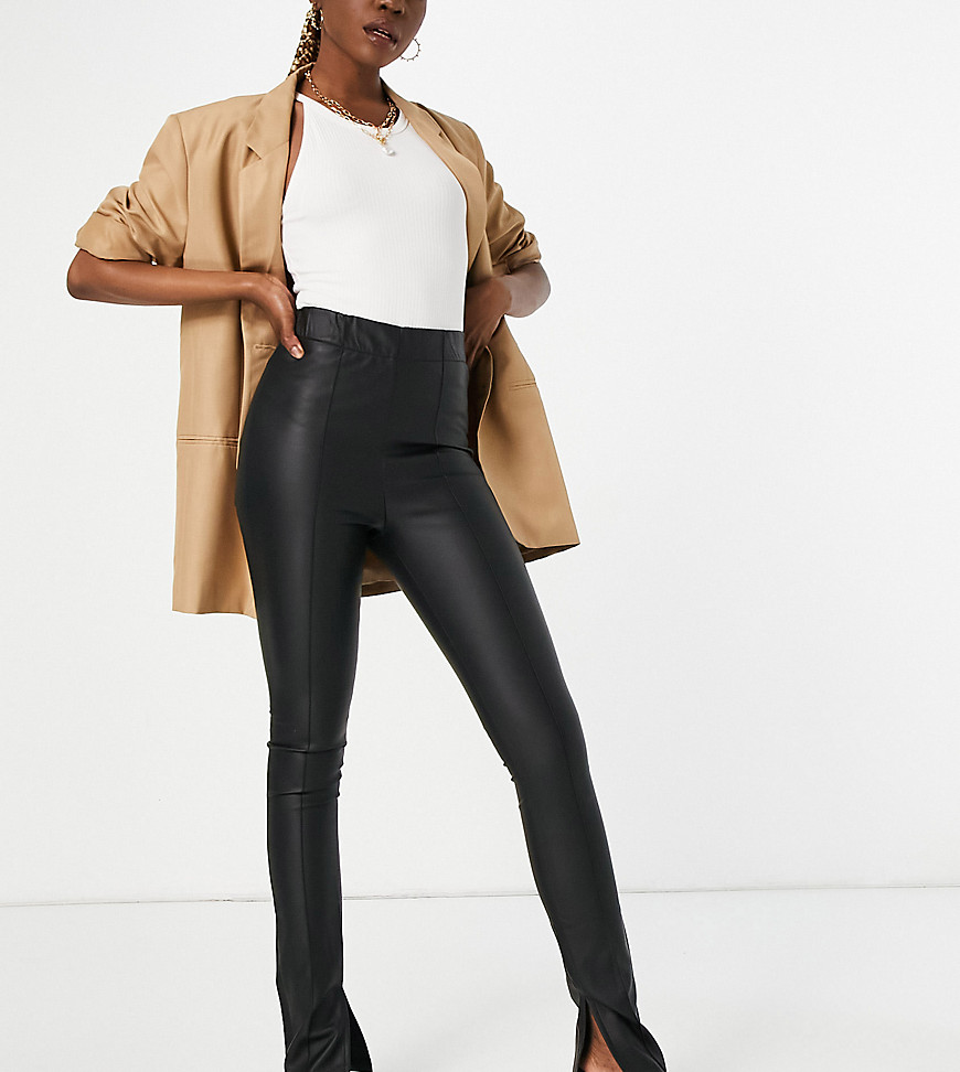 ASOS DESIGN Tall skinny pants in leather look with slit hem in black