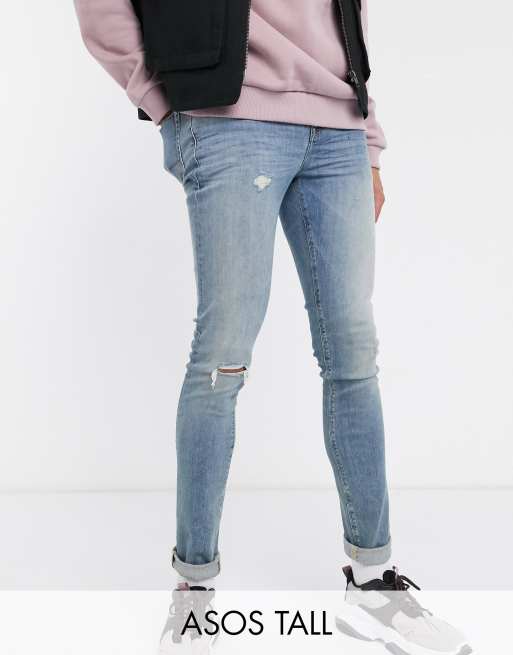 ASOS DESIGN super skinny jeans in mid wash blue with abrasions