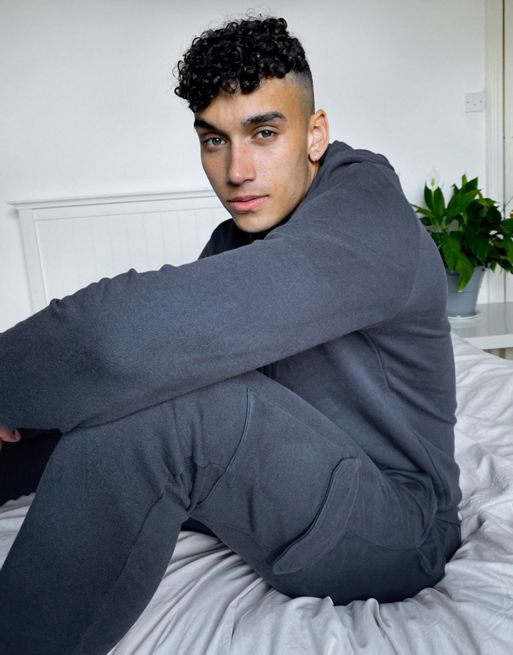 ASOS DESIGN - Survêtement ajusté composé d'un sweat à capuche et d'un  jogger cargo ajusté - Noir délavé