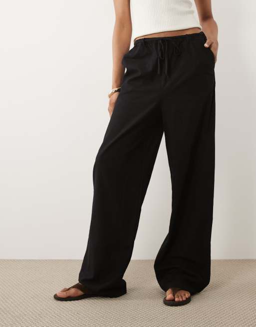 ASOS DESIGN Tall – Svarta byxor i linnestil och dra på-modell, 2 av 5